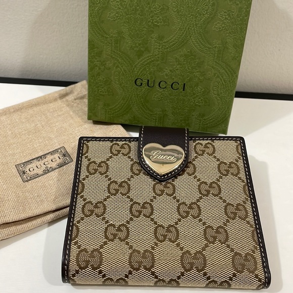 Gucci Handbags - SOLD❤️AUTHENTIC GUCCI MONOGRAM Heart Logo Bifold Wallet❤️